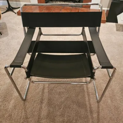 Marcel Breuer style B3 Wassily armchair in black leather and tubular chrome steel.
