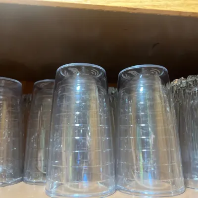 Collection of clear plastic highball tumblers 
