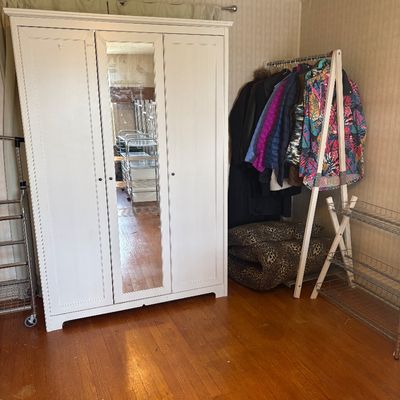 Sale Photo Thumbnail #75: Armoire/wardrobe + winter coats + folding clothing racks.