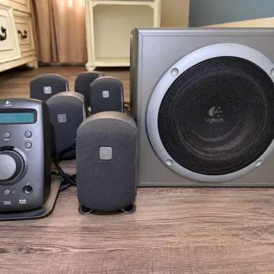 Logitech Z-5500 THX-certified 5.1 digital surround sound speaker system, including control console, subwoofer, and satellite speakers,...