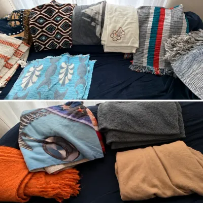 Collection of assorted throw blankets, quilts, and plush textiles featuring various patterns, textures, and designs.