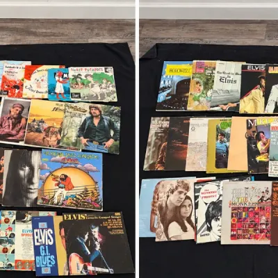 Large collection of vintage vinyl LP record albums featuring artists such as Elvis Presley, Willie Nelson, Neil Diamond, and The Monkees.