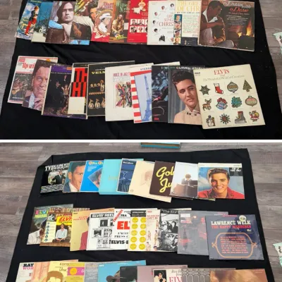 Large collection of vintage vinyl LP record albums, featuring various artists including Elvis Presley, Dean Martin, and Christmas...