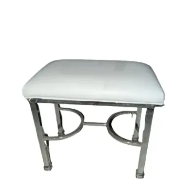 Modern vanity stool featuring a white cushioned leatherette seat and a chrome-plated metal frame with curved cross-bracing.