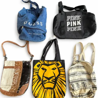 Collection of five assorted bags, including a vintage denim Guess bucket bag, a black Victoria's Secret PINK duffel, a patchwork...