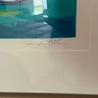 Detail of an artist's signature on a framed and matted print featuring cool green and purple tones.