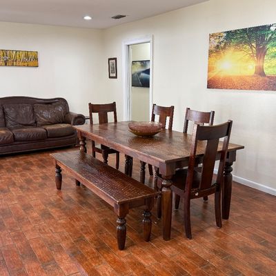 Solid wood dining room table with 4 chairs and matching bench 
