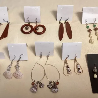 CCM073 Nine Pairs Of Seashell, Pearl, Pikake & Koa Earrings 