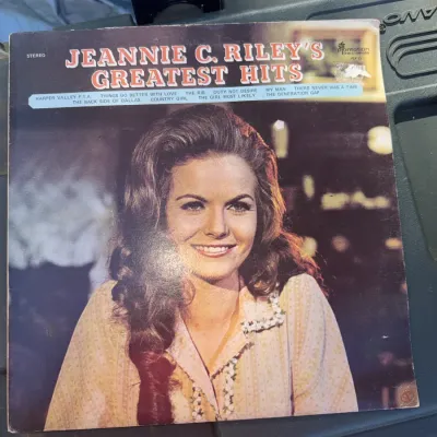 Sale Photo Thumbnail #13: Vintage vinyl LP album, "Jeannie C. Riley's Greatest Hits," released on Plantation Records in 1971. The sleeve shows some wear and edge rubbing.