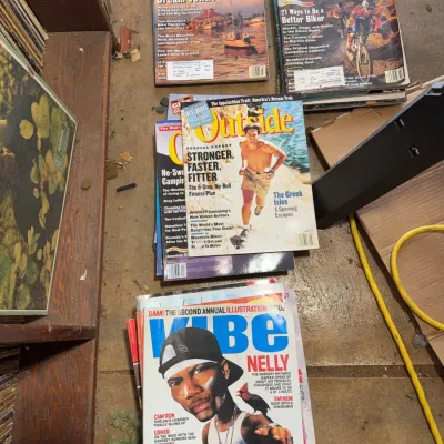Sale Photo Thumbnail #144: Collection of vintage magazines including issues of Outside and Vibe magazine, featuring Nelly on a September 2002 cover.