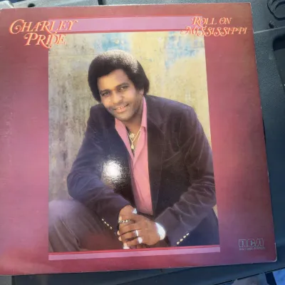 Sale Photo Thumbnail #11: Charley Pride "Roll On Mississippi" vinyl LP album released by RCA Records in 1981.