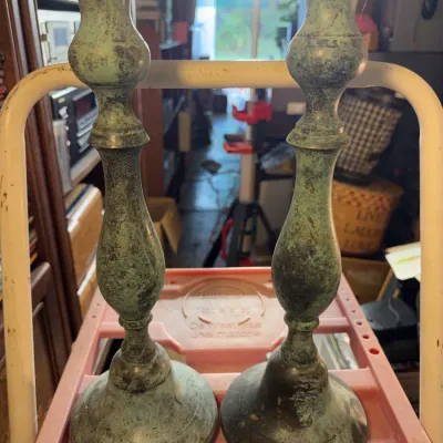 Sale Photo Thumbnail #150: Pair of vintage verdigris patinated metal candlesticks with baluster-form stems.