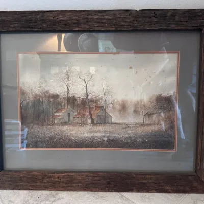 Sale Photo Thumbnail #118: Framed watercolor art print depicting a rural farm scene with barns and bare trees, housed in a wide rustic barnwood-style frame.
