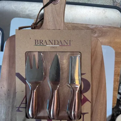 Sale Photo Thumbnail #127: Brandani Italy cheese knife set with acacia wood cutting board in original packaging.