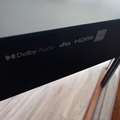 Sale Photo Thumbnail #104: Black soundbar featuring Dolby Audio, DTS, HDMI, and Energy Star logos.