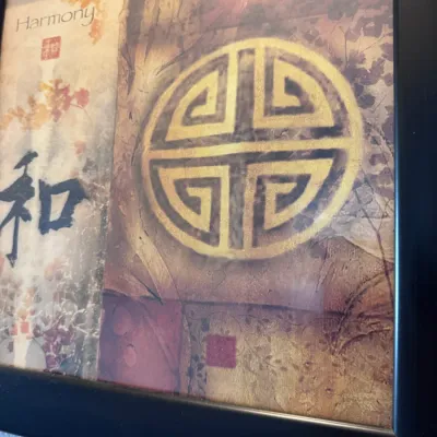 Sale Photo Thumbnail #147: Framed Asian-inspired wall art featuring a gold-toned circular symbol, calligraphy, and the word 'Harmony' in a simple black frame.