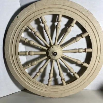 Sale Photo Thumbnail #108: Vintage painted wooden spinning wheel fly wheel featuring turned baluster-style spokes and an off-white finish.