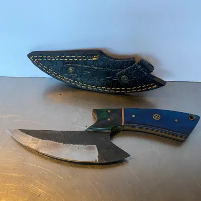 Sale Photo Thumbnail #61: Custom fixed-blade skinner knife with a multi-tone blue wood handle, mosaic pin, and matching black leather sheath.