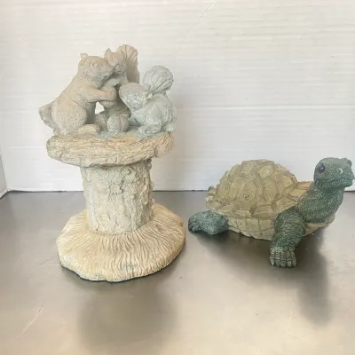 Sale Photo Thumbnail #25: Pair of resin garden statues, including a pedestal featuring three squirrels and a painted turtle figure with realistic shell detailing.