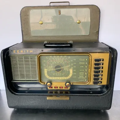 Sale Photo Thumbnail #46: Vintage Zenith Trans-Oceanic shortwave portable radio in a black leatherette flip-top case, circa 1950s.