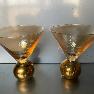 Sale Photo Thumbnail #38: Pair of postmodern amber glass martini glasses featuring metallic gold spherical bases.