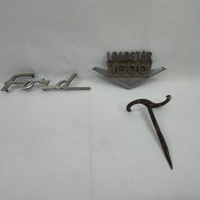 Sale Photo Thumbnail #449: 3 Auto Emblems & Hand Forged Tool