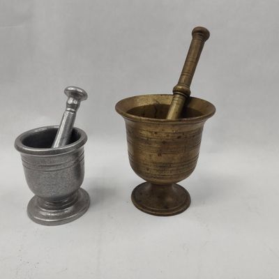 Sale Photo Thumbnail #317: Pair American Metal Mortar & Pestle