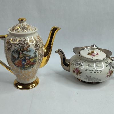 Sale Photo Thumbnail #447: Pair Ceramic Teapots w/ Gold & Silver