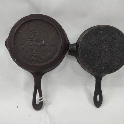 Sale Photo Thumbnail #288: Griswold & Ashley Cast Iron Pair