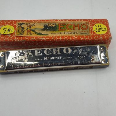 Sale Photo Thumbnail #436: M. Hohner Echo Tremolo Harmonica w/ Box