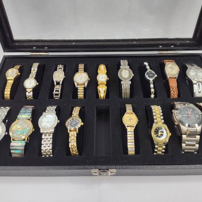 Sale Photo Thumbnail #242: Set Quartz Wristwatches in Display Case