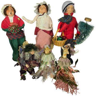 Sale Photo Thumbnail #52: An Assortment of Byers Choice Ltd Carolers and Animal Tassel Ornaments