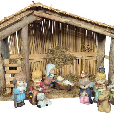 Sale Photo Thumbnail #49: A Twelve Piece Chinese Ceramic Nativity Set with Rustic Wooden Stable