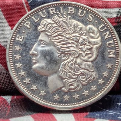 One Troy Oz. .999 Silver Morgan Design Round