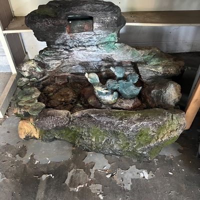 Sale Photo Thumbnail #7: Rustic resin tabletop or patio water fountain featuring a faux-rock structure, small basin, and duck figurines.