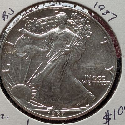 Sale Photo Thumbnail #134: 1987 American Silver Eagle One Troy Oz. .999 Fine Silver