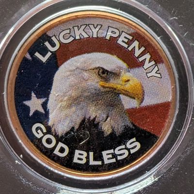 Sale Photo Thumbnail #119: Colorized God Bless Lucky Penny in sealed case
