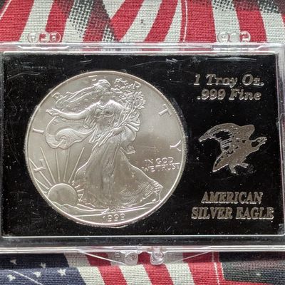 Sale Photo Thumbnail #325: 1999 American Silver Eagle One Troy Oz. .999 Fine Silver - In Display Case!