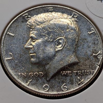 Sale Photo Thumbnail #277: 1964 Kennedy 90% Silver Half Dollar