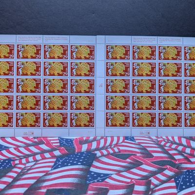 Sale Photo Thumbnail #322: (2) Sheets of 20 1994 Year of the Dog 29 Cent Stamps, $11.60 Face Value