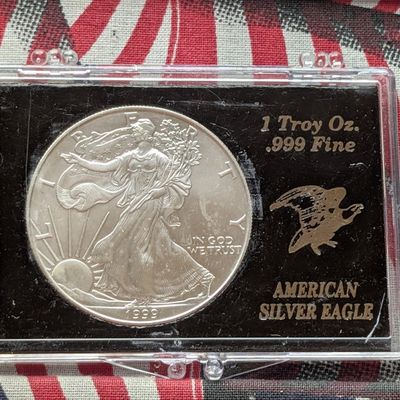 Sale Photo Thumbnail #64: 1999 American Silver Eagle One Troy Oz. .999 Fine Silver - In Display Case!