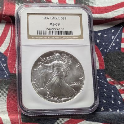 Sale Photo Thumbnail #289: 1987 American Silver Eagle One Troy Oz. .999 Silver NGC MS 69