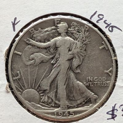 Sale Photo Thumbnail #99: 1945 Walking Liberty 90% Silver Half Dollar - WWII Era!