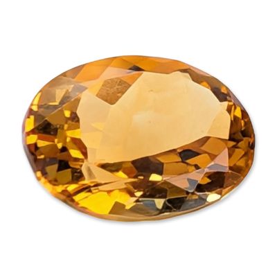 Sale Photo Thumbnail #389: Oval Faceted Yellow Orange Gemstone