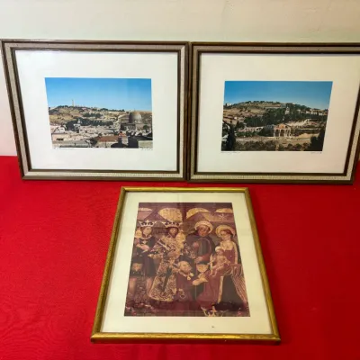 Set of three framed wall art pieces, including a pair of matted landscape photographic prints of Jerusalem and a gold-framed print...