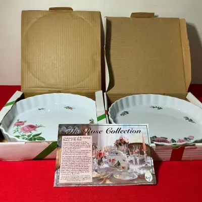 Pair of Royal Nordic Treasures ceramic pie dishes from The Rose Collection, in original cardboard boxes with promotional literature.