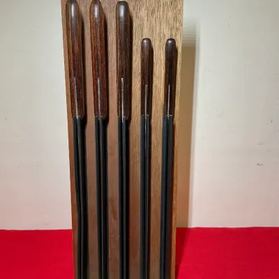 Vintage 5-piece Ekco Flint knife set with wooden handles in a matching wooden wall-mount block.