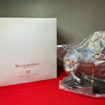 Lenox 'The Carousel Horse' fine porcelain figurine in original protective plastic, complete with its original presentation box.