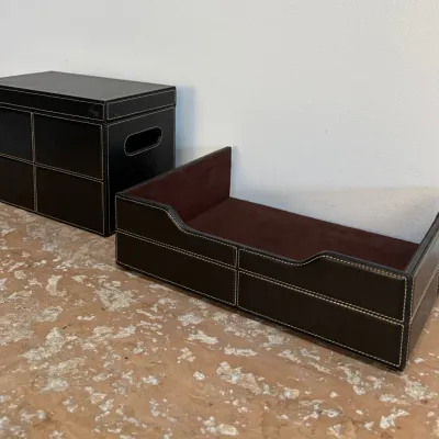 Sale Photo Thumbnail #79: Pair of contemporary dark brown faux leather desk organizers featuring white contrast stitching and burgundy suede-lined interiors.