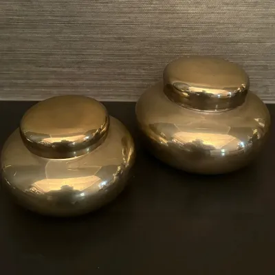 Sale Photo Thumbnail #68: Pair of vintage polished brass lidded containers or ginger-style jars with rounded modern forms.
